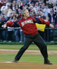 Jack Abramoff looks on from the stands has President Bush throws out the ceremonial first pitch.