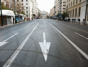 Vacant city street awaits parade of terrorist conquerors