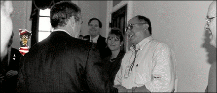 Lobbyist Jack Abramoff with President Bush, behind Waldo.